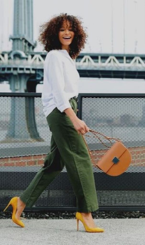 Green statement pants with white shirt for work